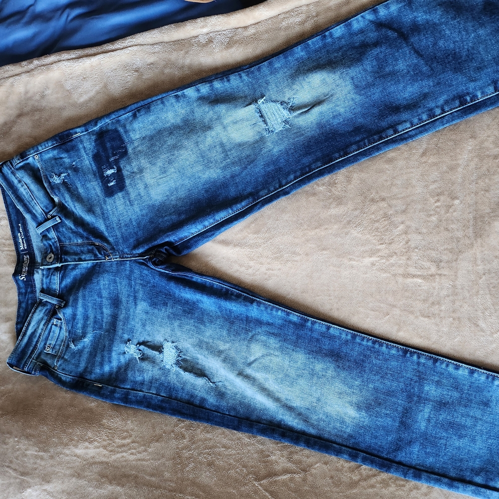 Blue Boot Cut Jeans with Distressed Look